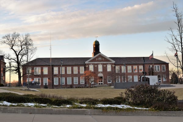 Young Hall, a red brick building with a white cupola, across the lawn at Lincoln University in Jefferson City.