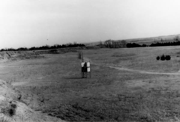 A 1969 black-and-white view across the grassy natural amphitheater at the Medicine Lodge Peace Treaty Site.