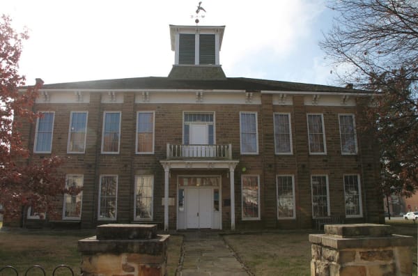 The two-story stone Muscogee (Creek) Nation Council House in Okmulgee with its cupola.