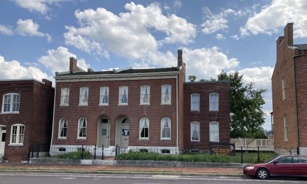 The two-story red brick row houses on Delmar Boulevard that include the Scott Joplin House in St. Louis.