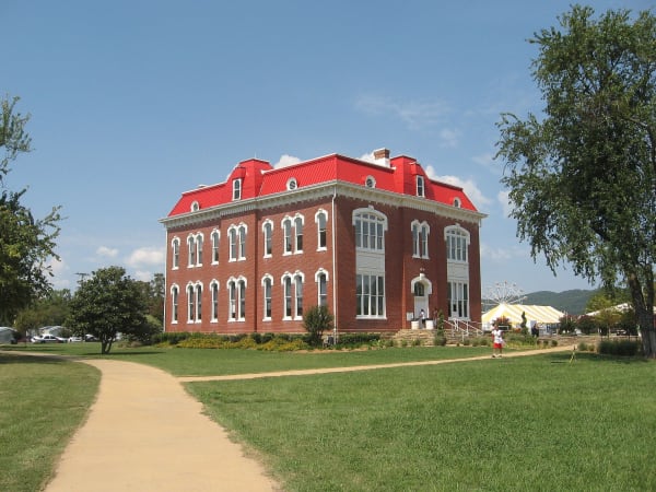 The red-roofed 1884 brick Choctaw Nation capitol at Tvshkahomma.
