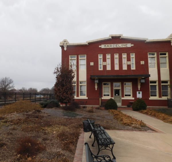 The red brick Santa Fe depot in Marceline that houses the Walt Disney Hometown Museum, on a gray winter day.