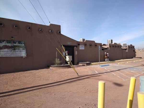 The brown adobe-style walls of the Tigua Indian Cultural Center at Ysleta del Sur Pueblo in El Paso.
