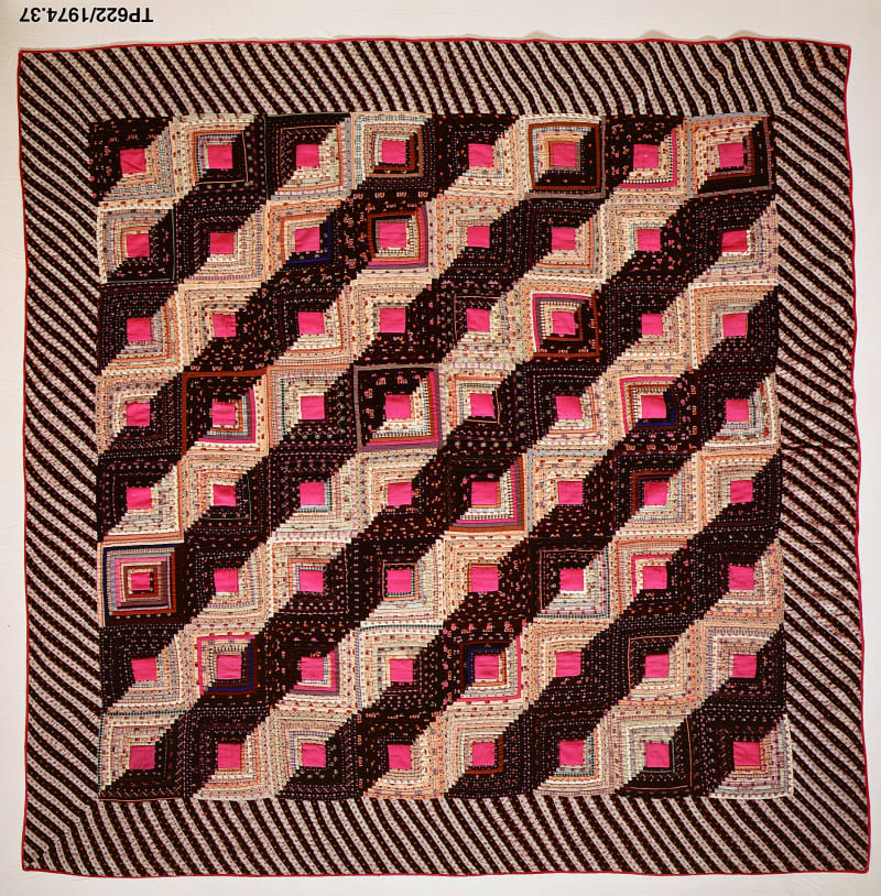 An American pieced quilt in the Log Cabin pattern, Straight Furrow variation, made around 1875 — the patchwork tradition behind the name of Scenic Byway 143, the "Patchwork Parkway."