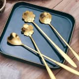 Golden Flower Design Stainless Steel Spoon for Coffee, Tea & Desserts | Elegant Decorative Serving Spoon for Home, Kitchen & Parties thumbnail 1