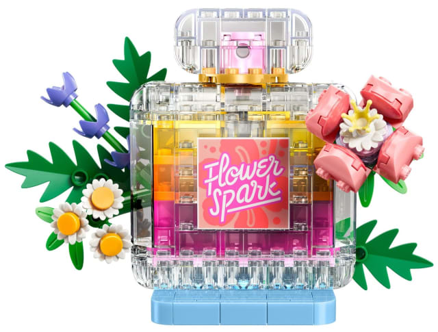 Flakon perfum z kwiatową ozdobą