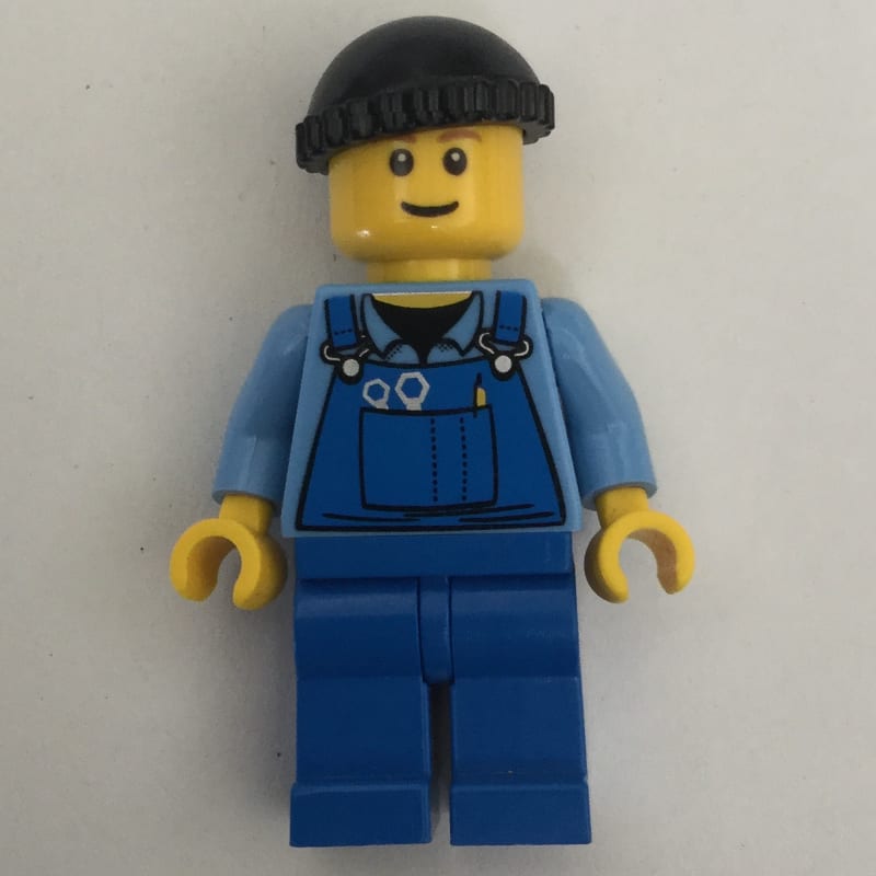 Man, Blue Overalls over Shirt, Blue Legs, Black Hat, Reddish Brown Eyebrows