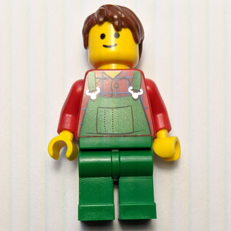 Farmer in Green Overalls