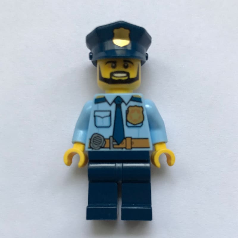 Policeman Captain Ember, Bright Light Blue Shirt with Radio and Badge, Dark Blue Legs, Police Hat with Badge, Beard