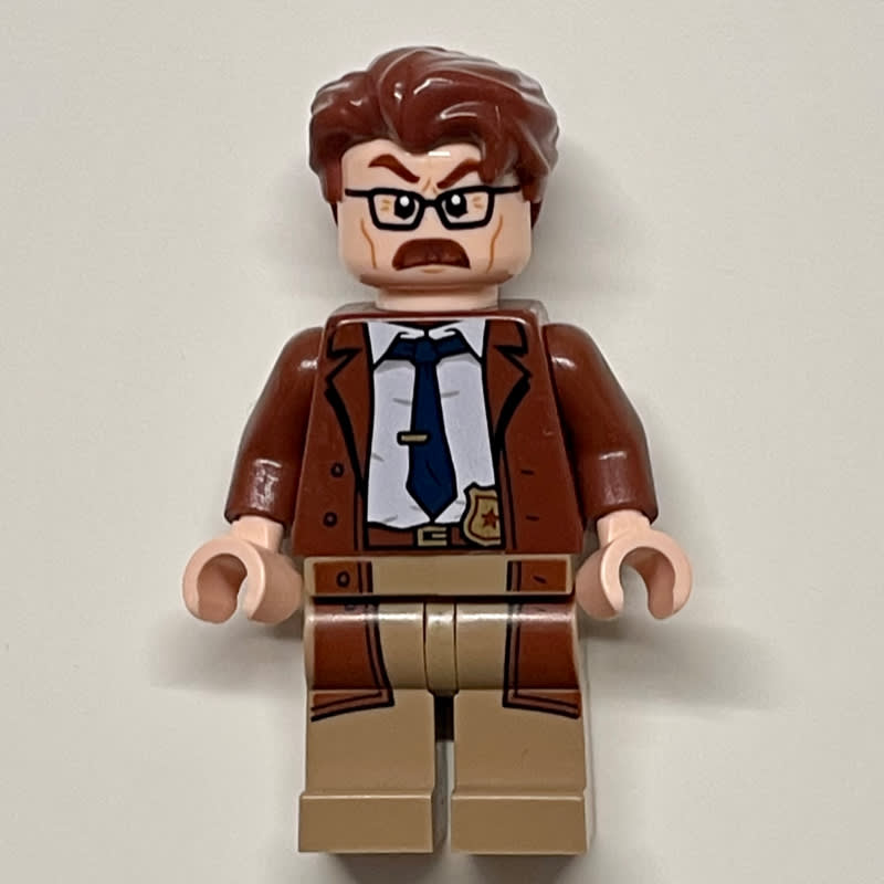 Commissioner James Gordon with Reddish Brown Hair and Long Coat