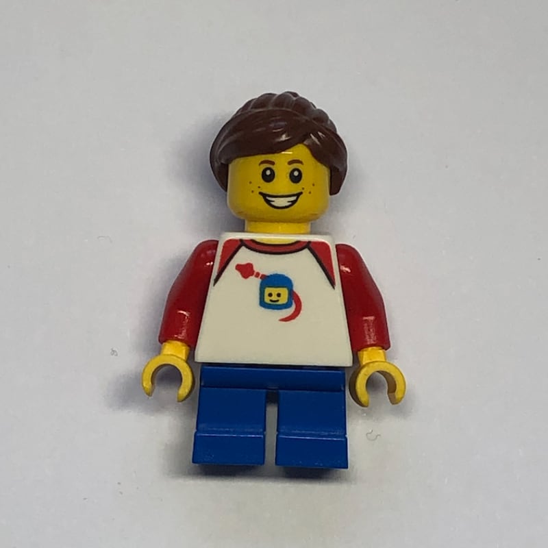 Girl, Classic Spaceman on Shirt, Short Blue Legs, Reddish Brown Ponytail