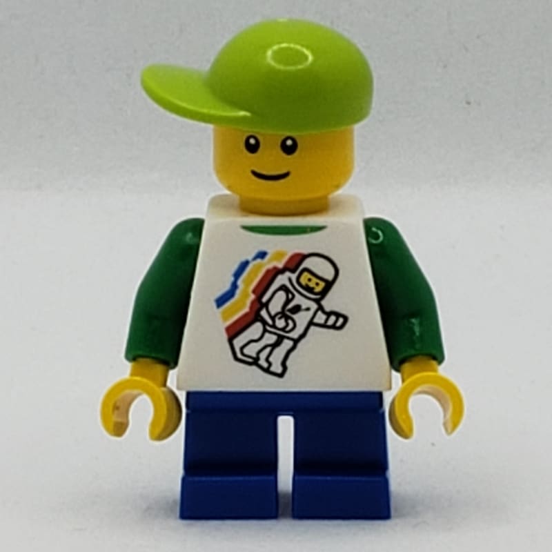 Boy, Floating Classic Spaceman on Shirt, Short Blue Legs, Lime Cap, Reddish Brown Eyebrows