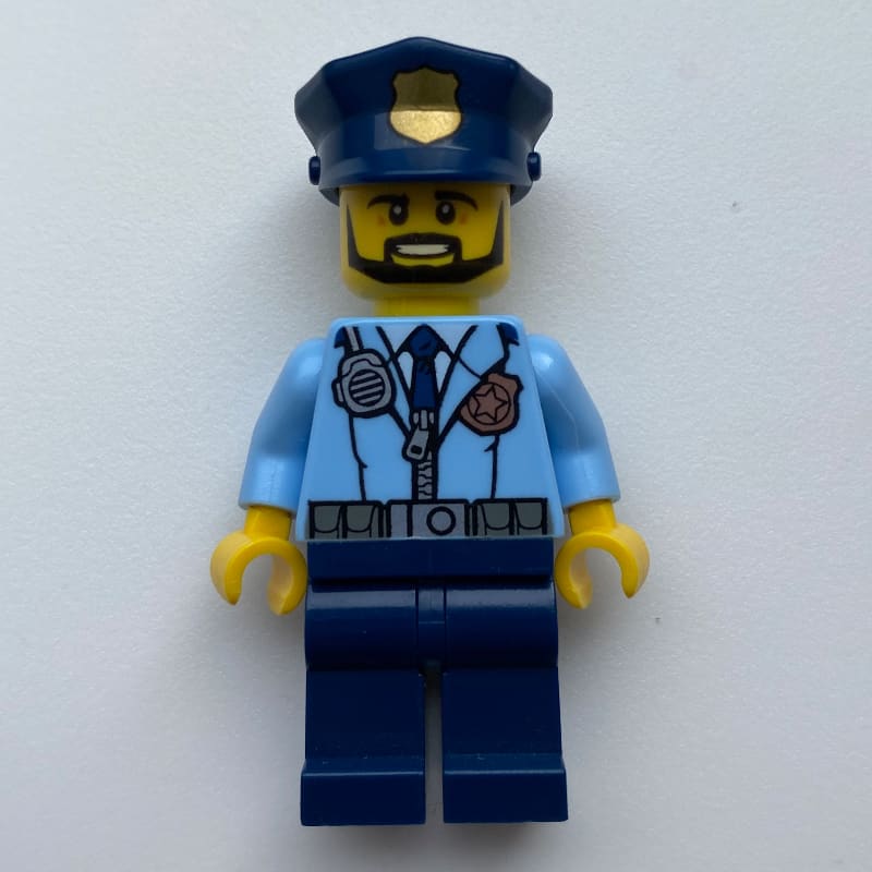 Policeman, Bright Light Blue Jacket with Zipper, Radio, Badge, and Tie, Dark Blue Legs, Dark Blue Police Hat with Badge, Beard