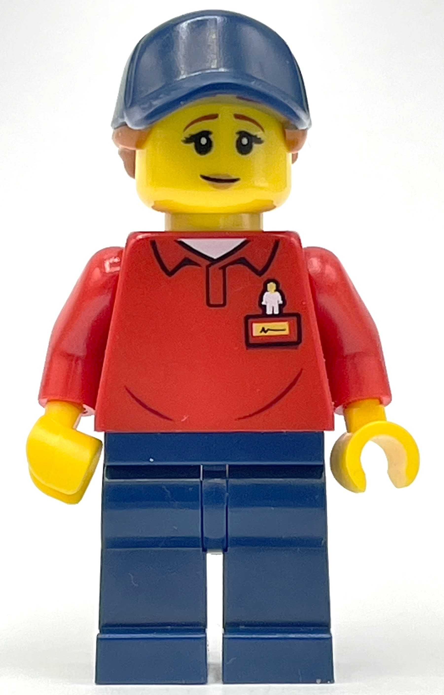 LEGOLAND Employee, Red Torso, Dark Blue Legs, Dark Blue Cap, Reddish Brown Hair