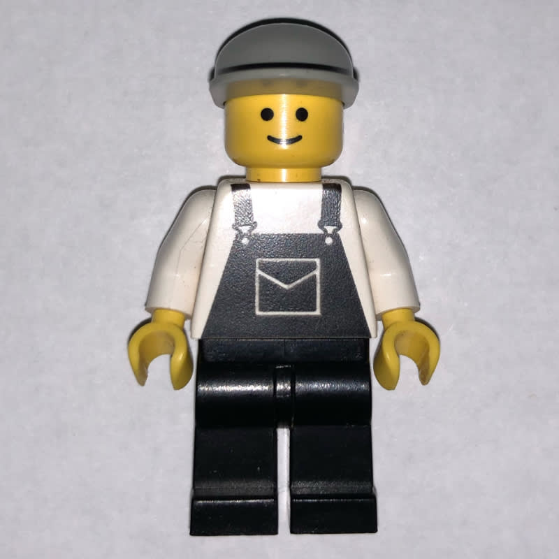 Man, Black Overalls, Light Gray Cap