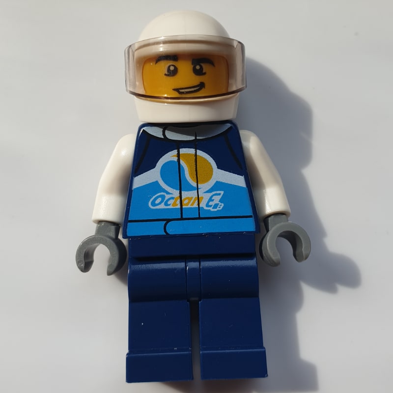 Racer, Dark Blue Jumpsuit with Octan E Logo, White Helmet with Visor