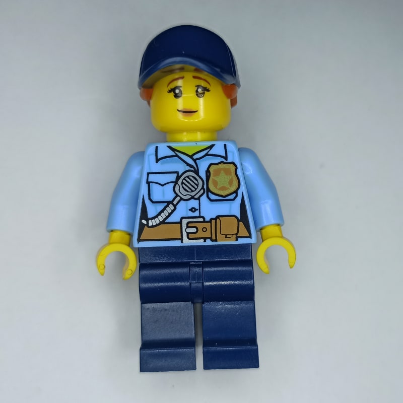 Policewoman, Bright Light Blue Shirt, Dark Blue Legs, Dark Blue Cap with Ponytail
