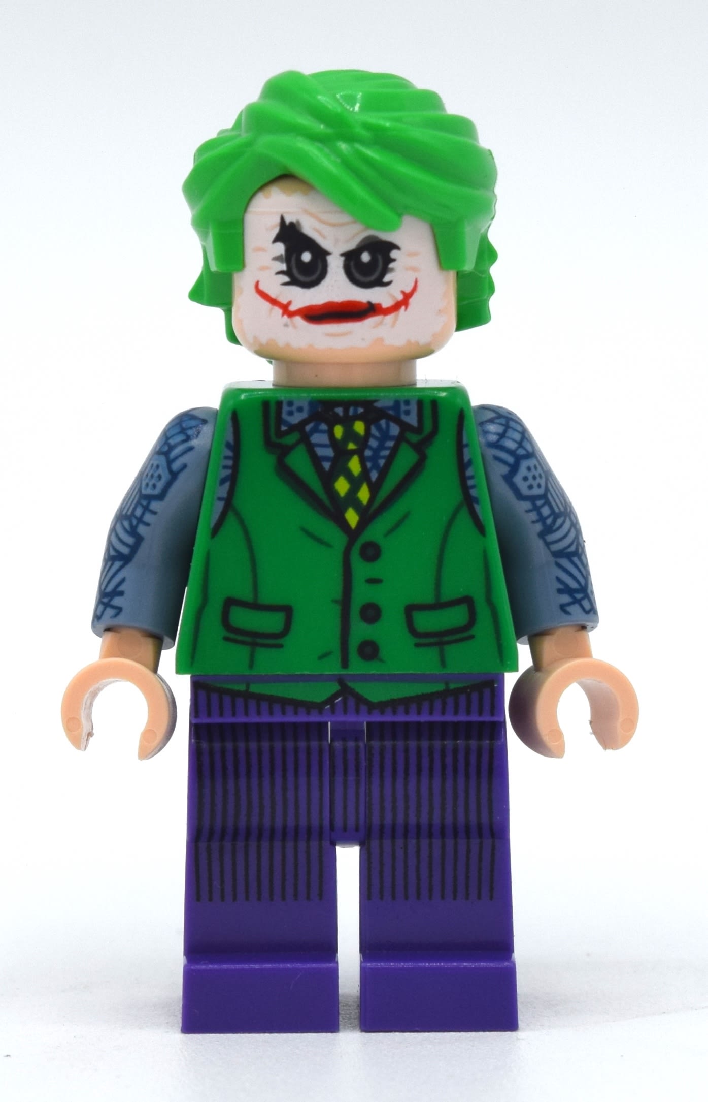 The Joker with Green Vest and White Face Make-up (Dark Knight Trilogy)