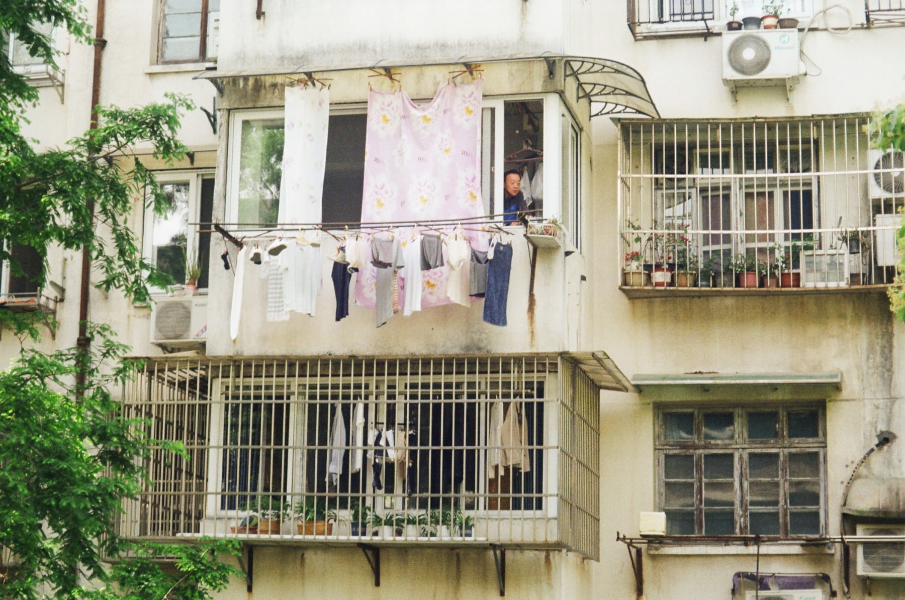 Laundry hanging outside apartment windows