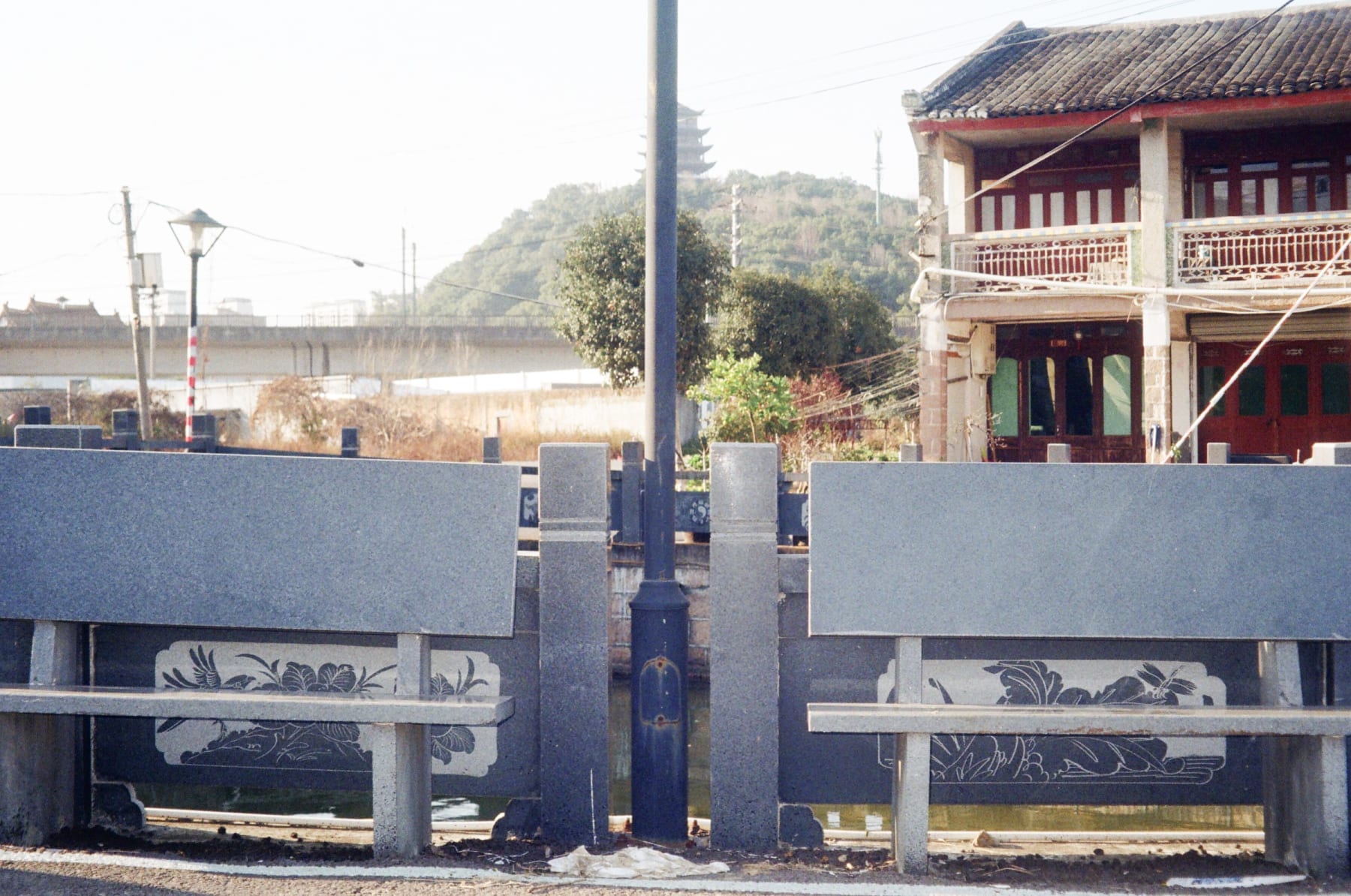 Stone railings beside a house