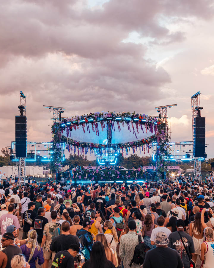 The main stage under an evening sky