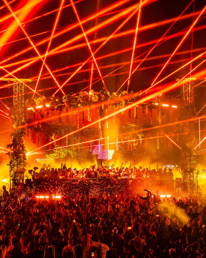 Orange lasers across the main stage