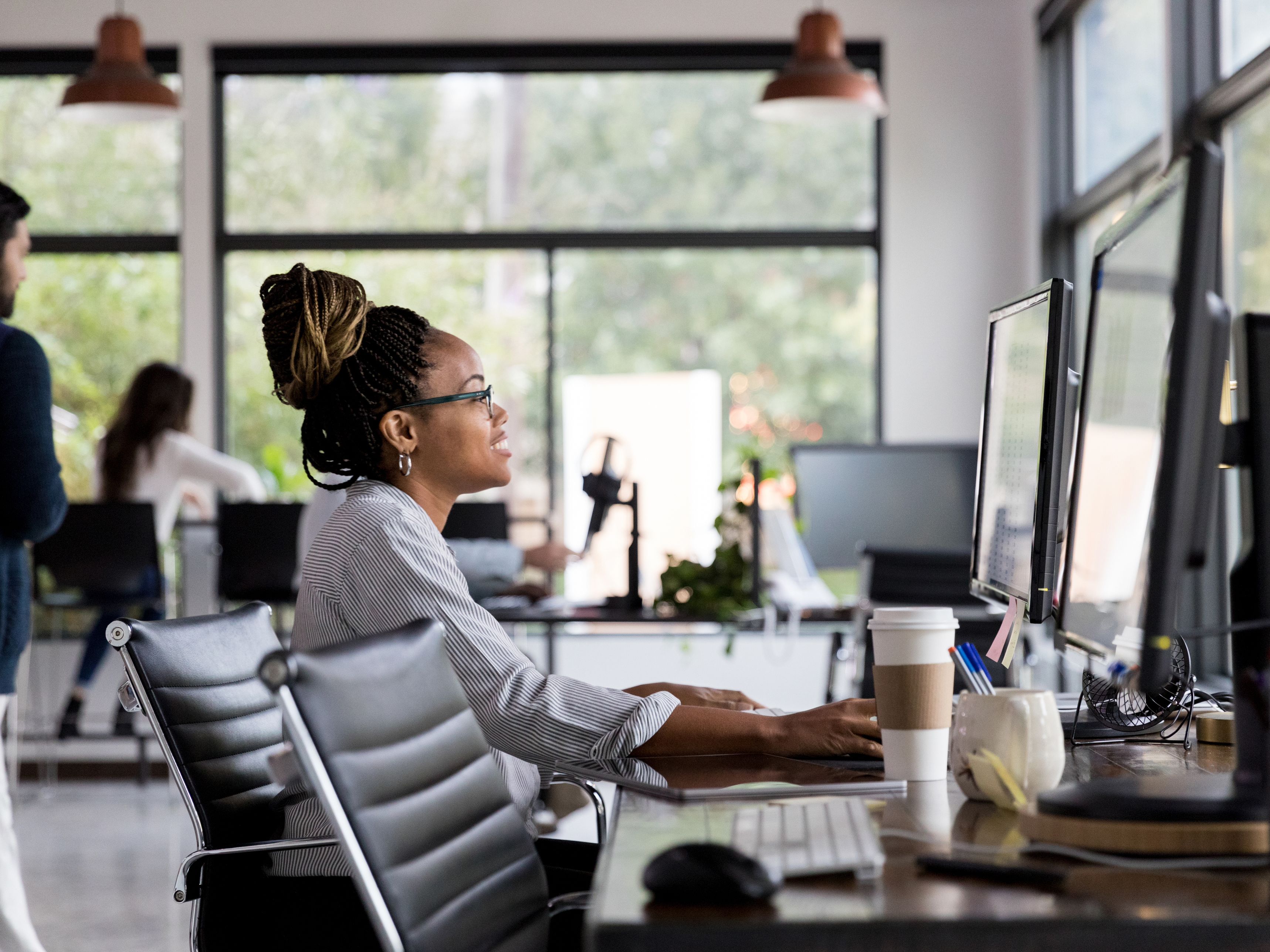 Woman working at her computer in an office.