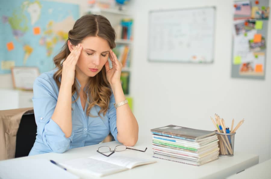 stressed teacher in classroom