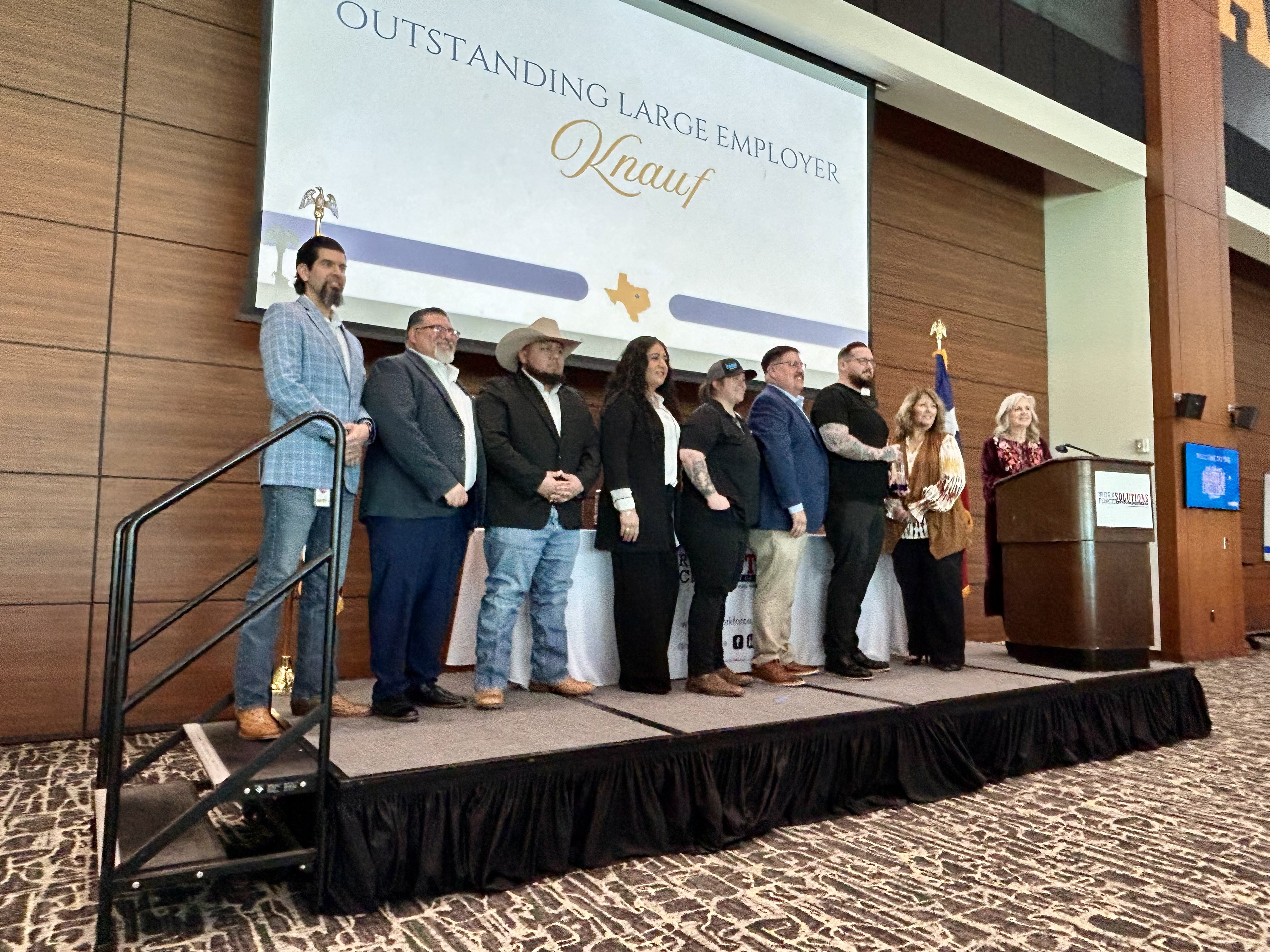 Knauf McGregor employees on stage at the 2026 Annual Awards of Excellence Banquet