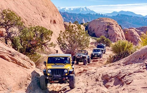 Jeeps traversing a trail at Jeep Jamboree