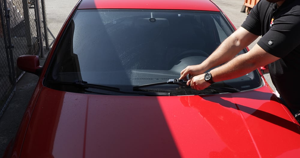 Servicing windshield wipers