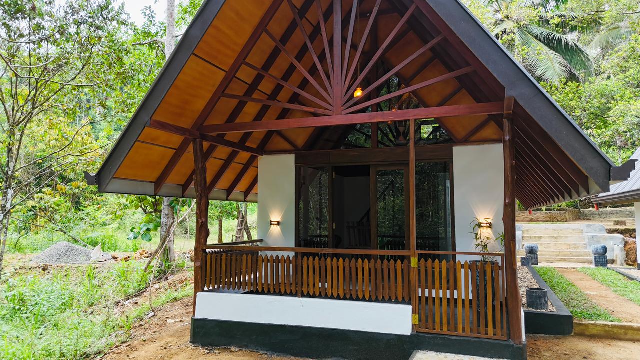 Front view of the handcrafted A-frame wooden chalets