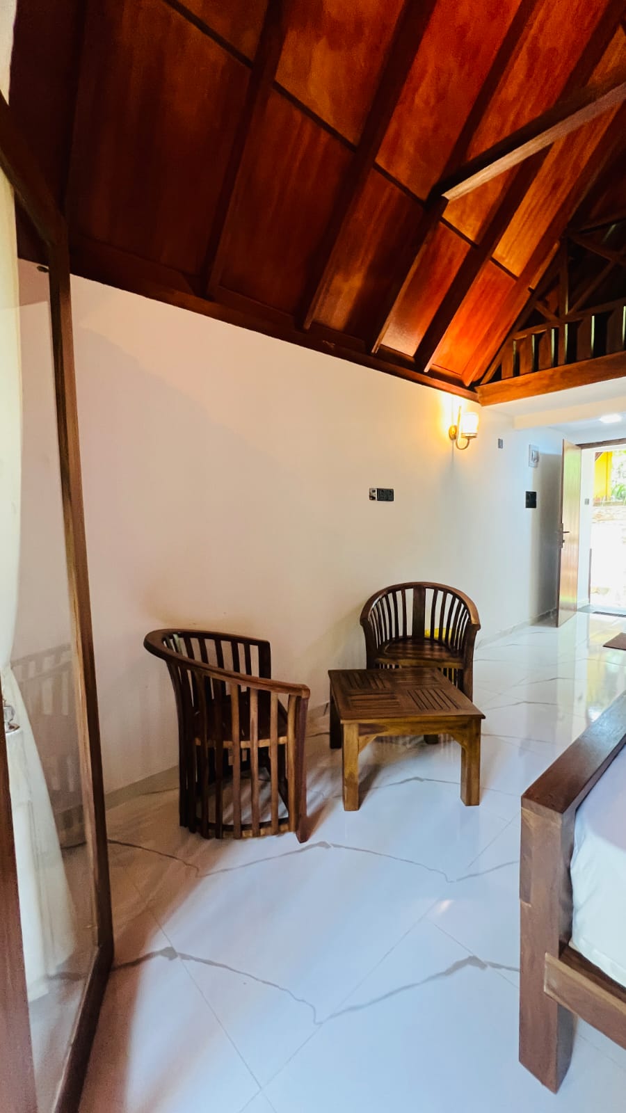 Comfortable timber armchair seating area