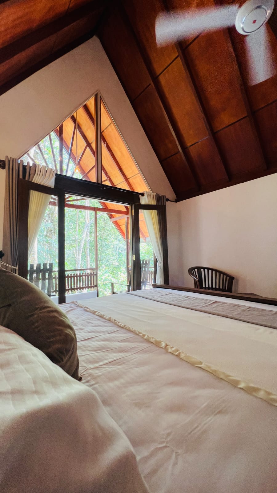 Handcrafted wooden bed and morning light