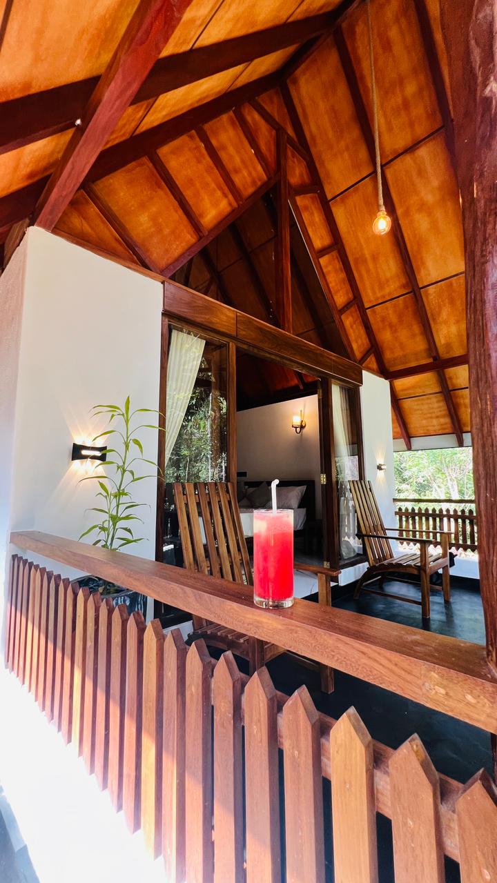 Chalet veranda with welcome drink overlooking the river