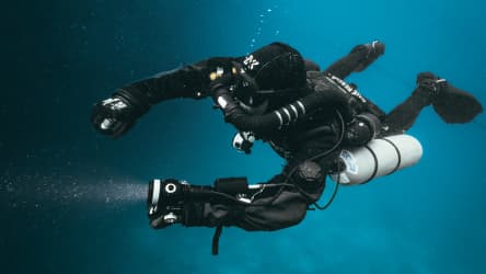 Koh tao divers CCR diver exploring underwater environment with KISS Sidewinder rebreather system