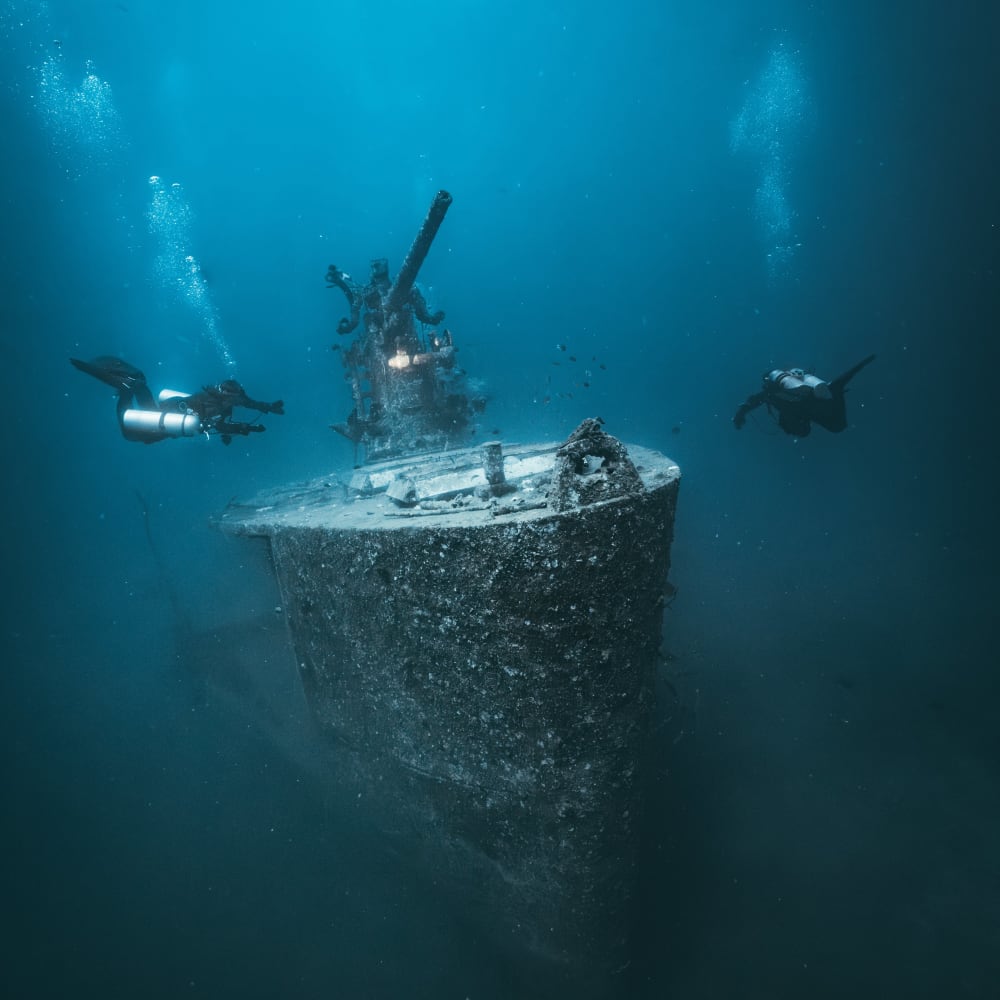 Koh Tao Divers technical divers approaching the bow of a sunken warship