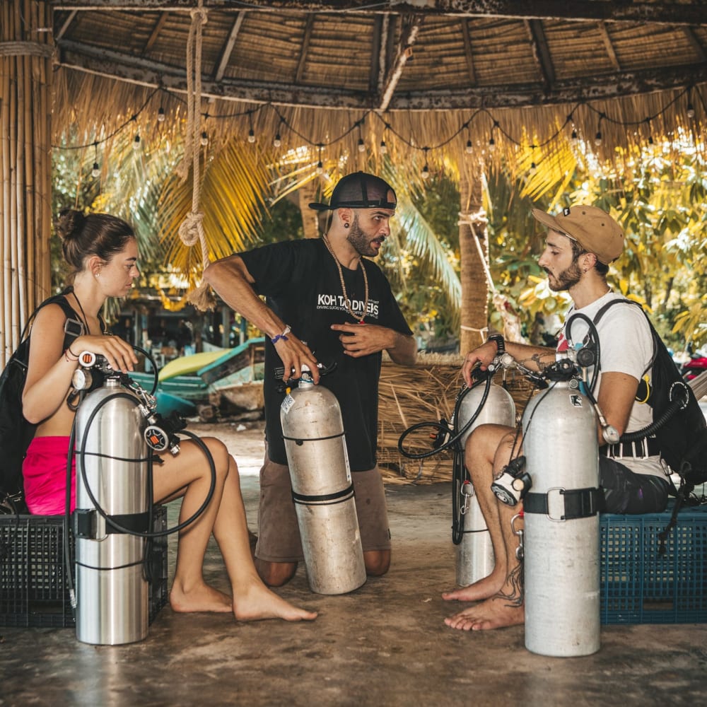 Koh Tao Divers technical diver instructor holding a lecture about technical diving in bamboo hut
