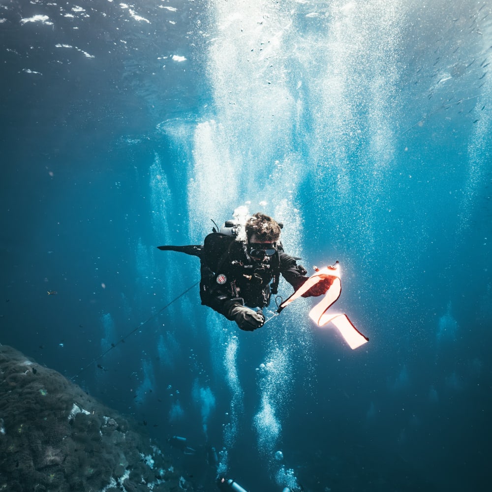 Koh Tao Divers technical diver ascending through the water column with proper trim