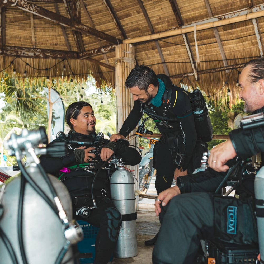 Koh tao divers CCR divers preparing their units in a bamboo hut
