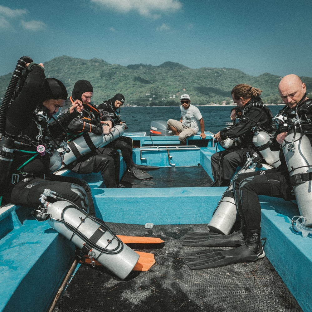 Koh tao divers group of CCR divers on the boat before going on a rebreather training dive