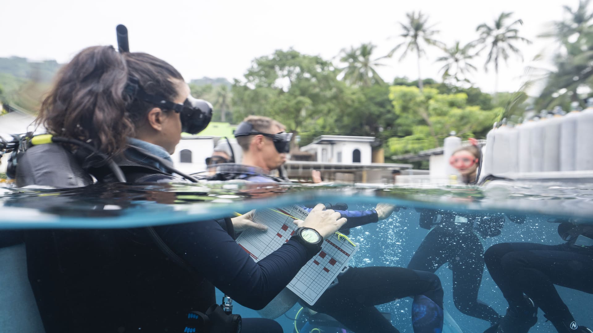  Koh Tao Divers instructor evaluating students during underwater scuba diving training