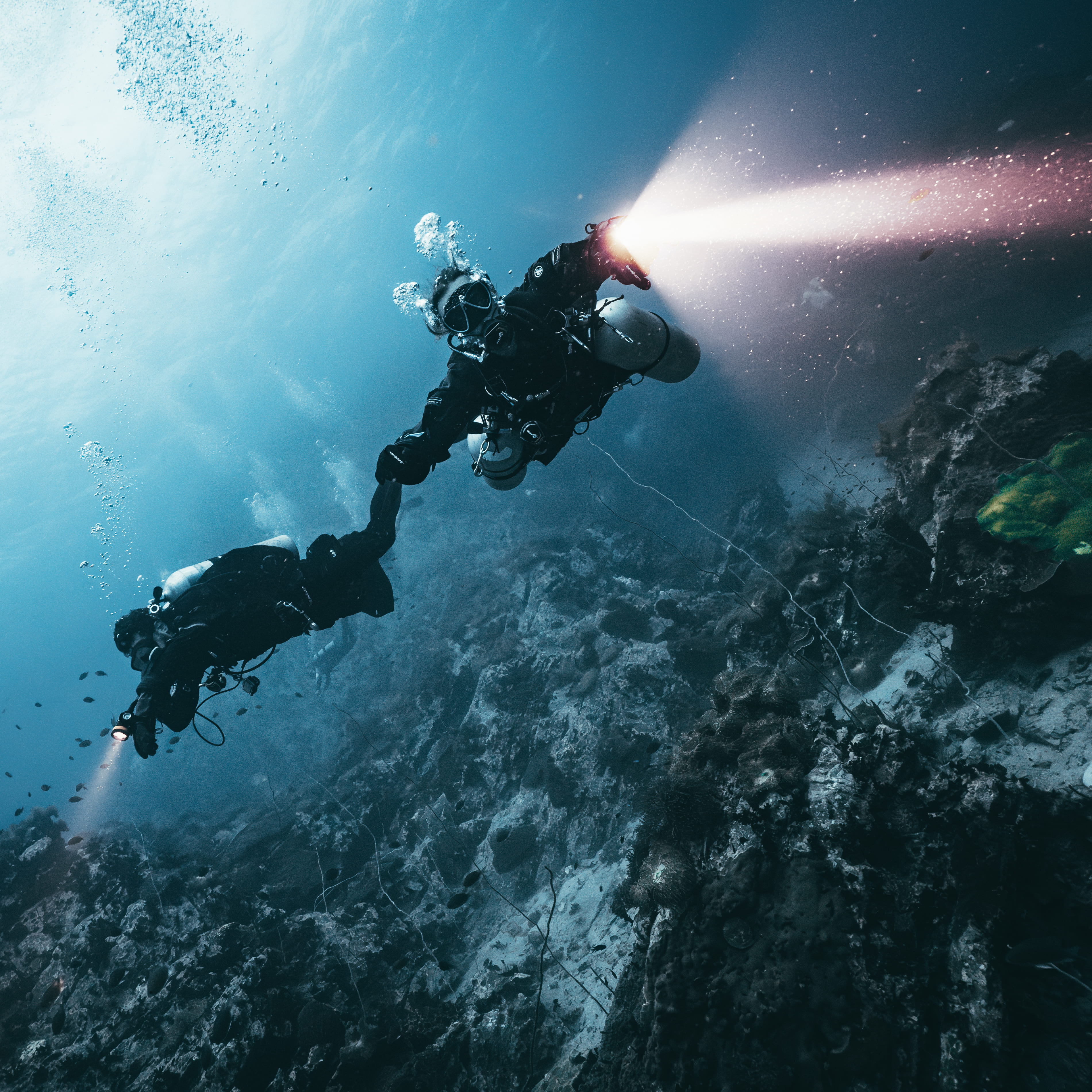 Koh Tao divers diving with sidemount gear and torchs