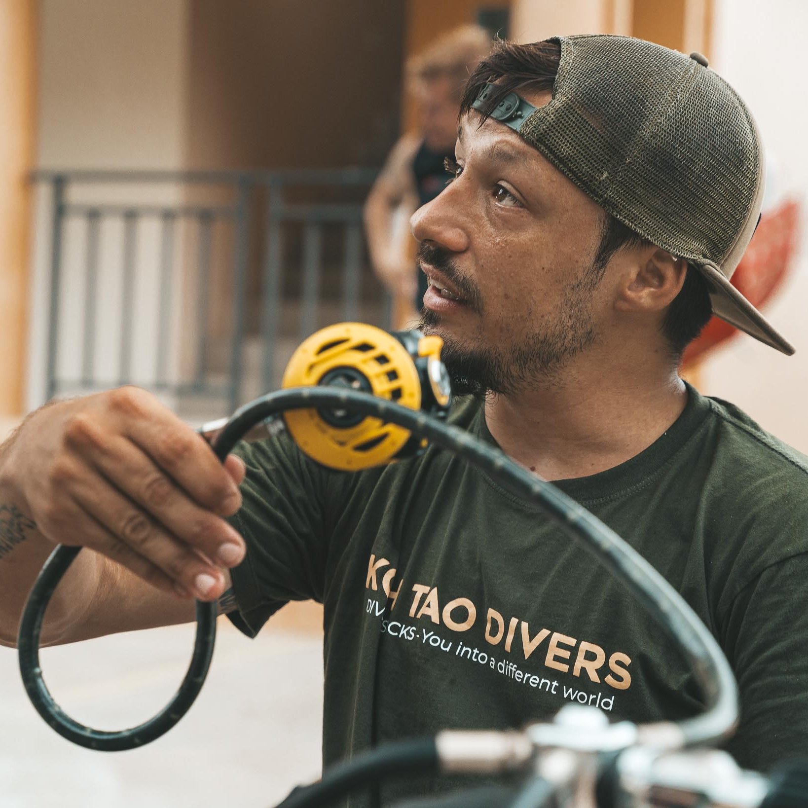 Koh Tao Divers instructor teaching regulator skills