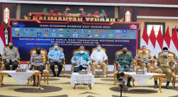 Kasrem 102/Pjg Menghadiri Kegiatan Puncak Peringatan Hari Otonomi Daerah Ke XXV Tahun 2021 secara virtual