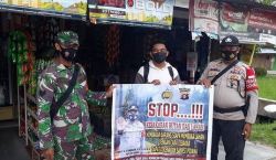 Babinsa dan Bhabinkamtibmas Langkai Edukasi Prokes dan Karhutla