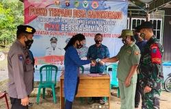 Anggota Koramil 1013-01/Kandui Bersama Polsek Kandui Sosialisasi Prokes Masa PPKM Berskala Mikro Kepada Warga.