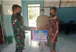 Babinsa Koramil 1016-05/Tumbang Jutuh Pastikan Penyaluran BLT-DD Berjalan Aman