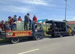 ANGGOTA KORAMIL KURUN GIAT PENYEMPROTAN DISINFEKTAN BERSAMA PEMKAB GUNUNG MAS.