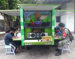 Si-Komos Kodim Palangka Raya Sebagai Sarana Perpustakaan Keliling Bagi Anak-Anak